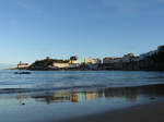 FZ020911 Reflection in beach of colourful houses in Tenby.jpg